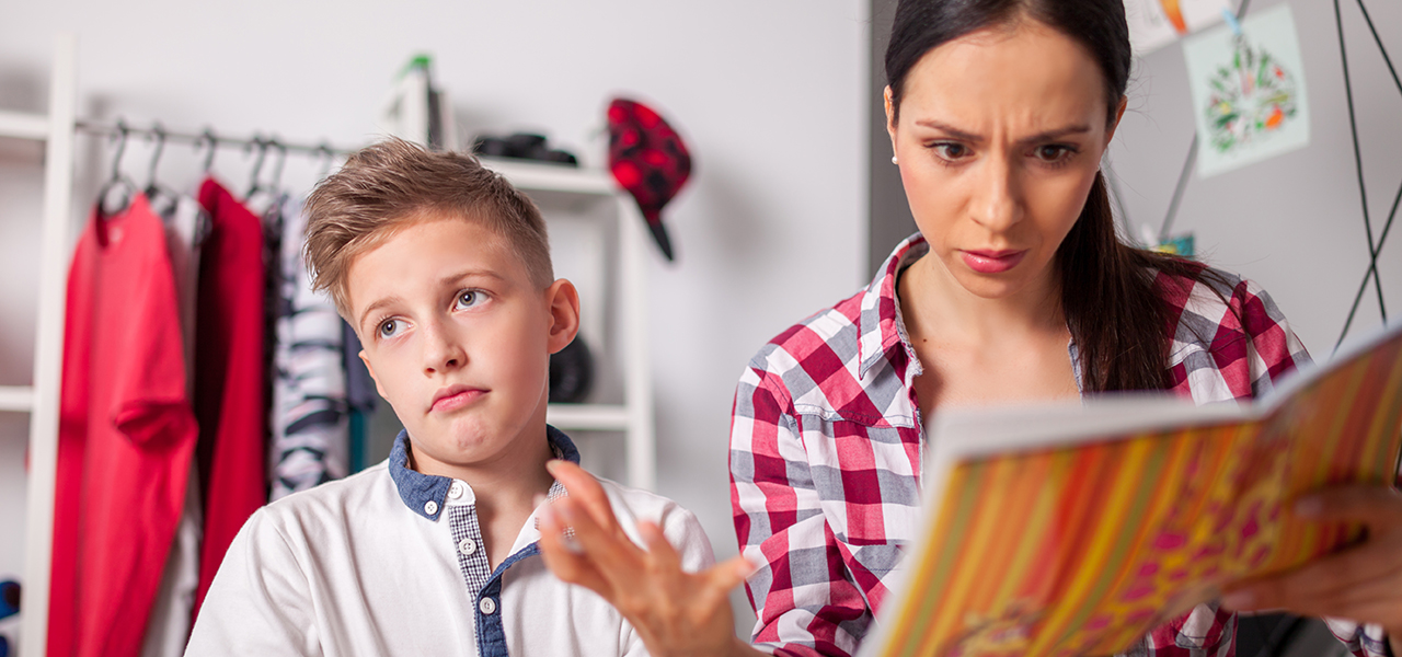 Son doesn't listen to mother discussing schoolwork