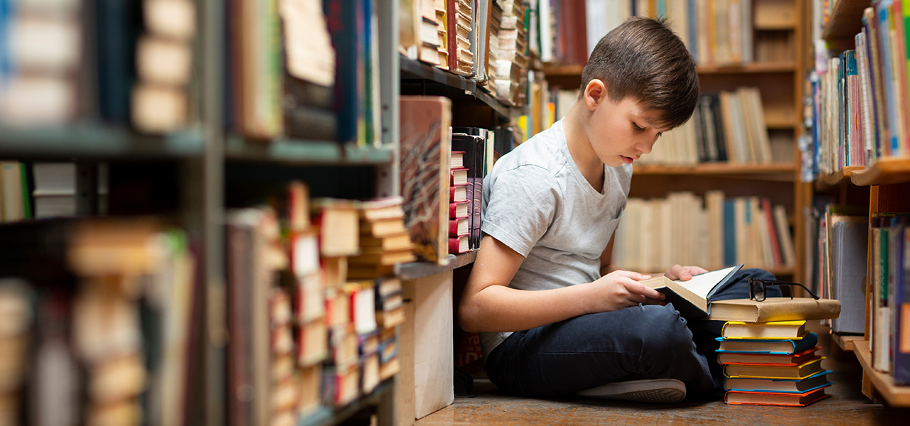 Boy having trouble sounding out words reading