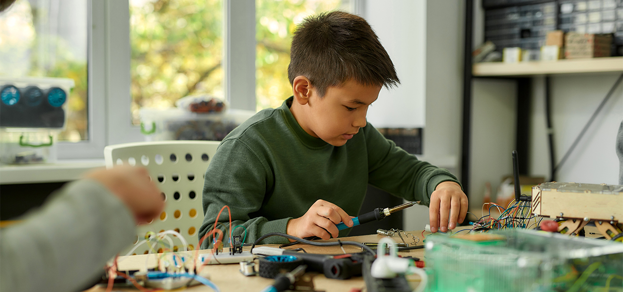 Gifted boy follows his interests completing soldering projects