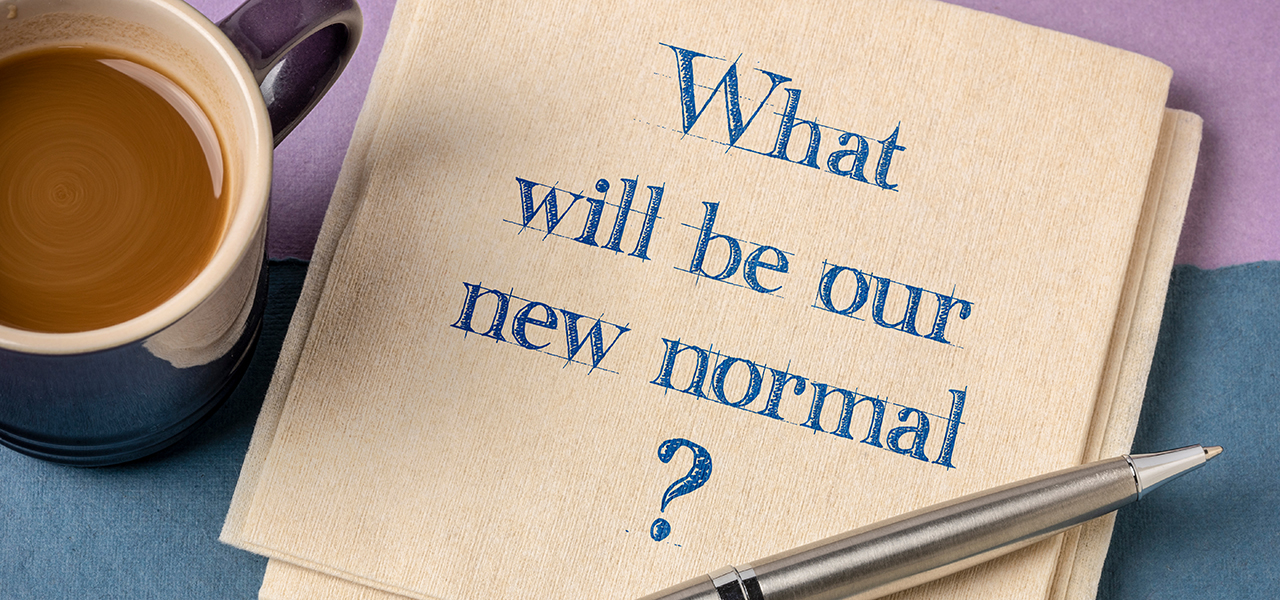 "What will be our new normal?" written on a napkin next to a cup of coffee